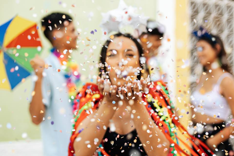 Carnival dancer in a shower of confetti