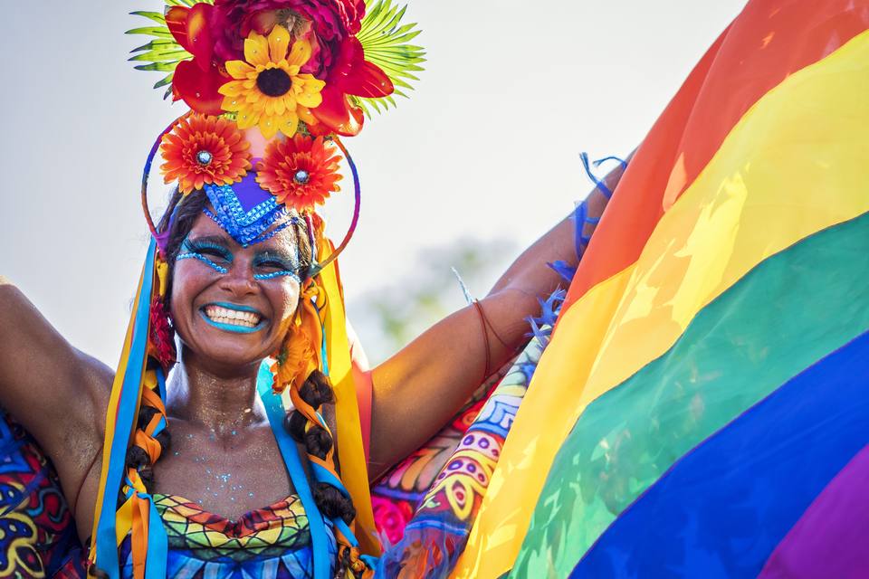 Carnival dancer in feathers and colour