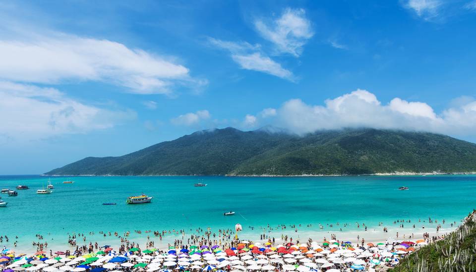 White sand and bright blue water at Arraial do Cabo