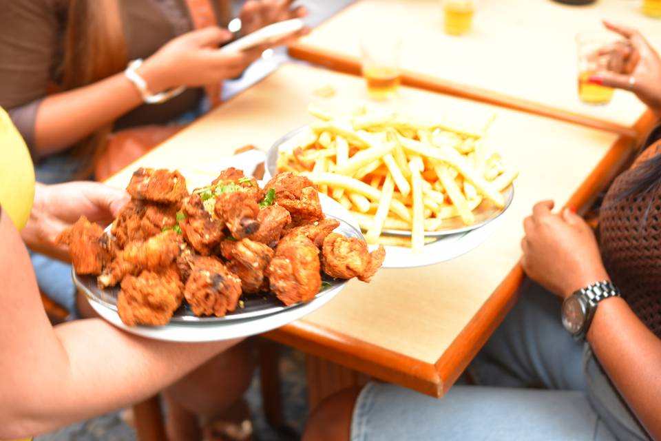 A shared table of Brazilian plates